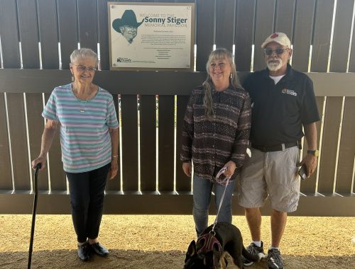 Sonny's wife Bev, daughter Michelle and son-in-law Rocky unvield the dedication sign.