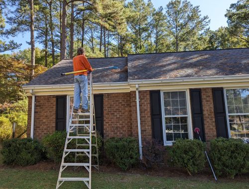 Raking,Pine,Straw,Off,A,Residential,Roof,Is,One,Method